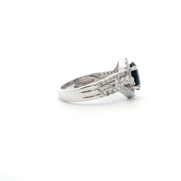 14KW Oval Sapphire and Diamond Halo Swirl Ring Image 4 Kiefer Jewelers Lutz, FL