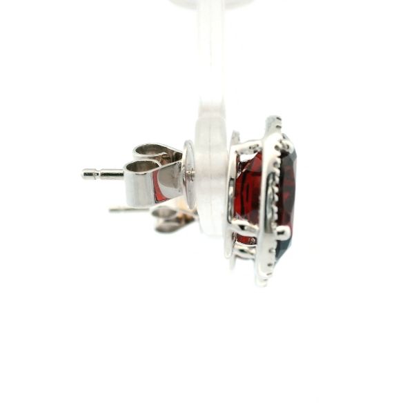 14KW Oval Garnet and Diamond Halo Stud Earrings Image 3 Kiefer Jewelers Lutz, FL