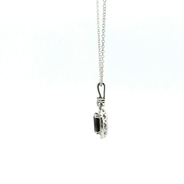 14KW Garnet and Diamond Oval Halo Necklace Image 4 Kiefer Jewelers Lutz, FL