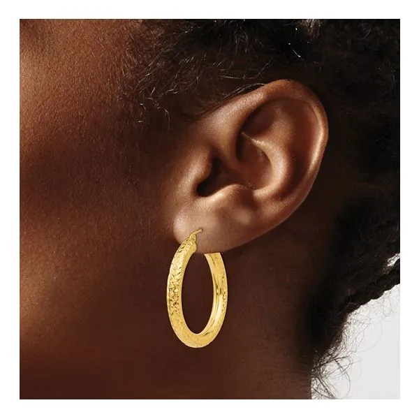 14K yellow gold diamond cut hoop earrings Image 3 Lake Saint Louis Jewelers Lake Saint Louis, MO