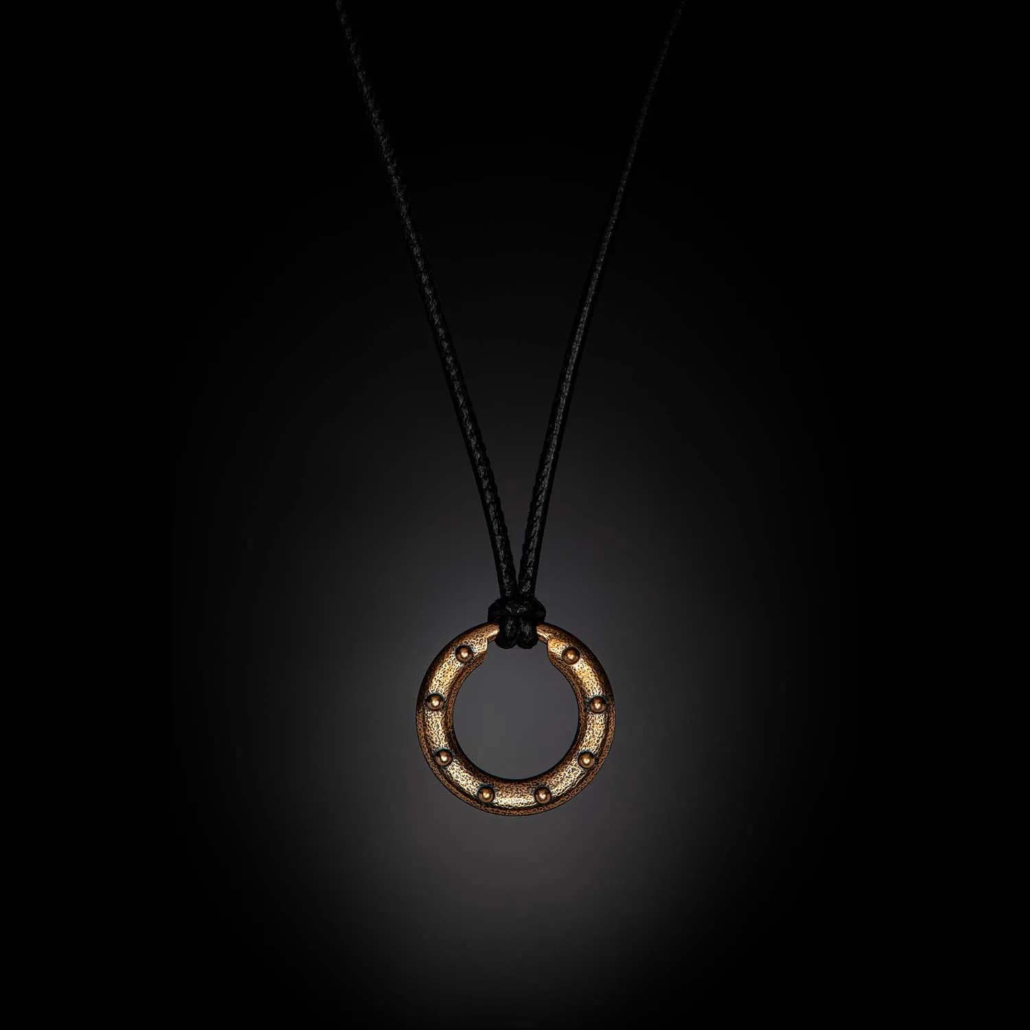William Henry Bronze Orbit Pendant on Leather Cord, 22" in Length La Mine d'Or Moncton, NB