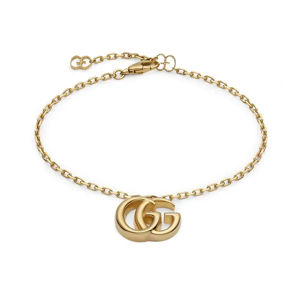 Gucci Running G Bracelet in 18kt Yellow Gold with Double GG Pendant La Mine d'Or Moncton, NB