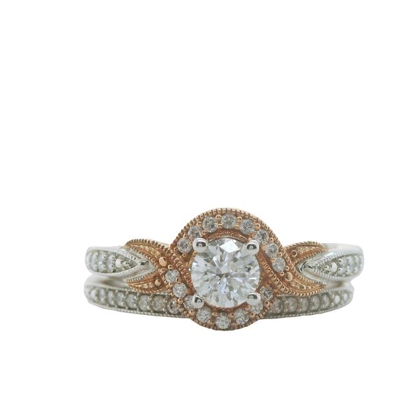 10KT WHITE AND ROSE GOLD BRIDAL SET WITH ENGAGEMNT RING CONTAINING ONE ROUND CENTER DIAMOND .33CT W/ ROSE GOLD MILGRAIN HALO CONTAINING ROUND DIAMONDS W/ ROUND BEAD SET DIAMONDS IN SHANK WITH MATCHING WEDDING BAND CONTAINING BEAD SET DIAMONDS WITH MILGRAI Lennon's W.B. Wilcox Jewelers New Hartford, NY