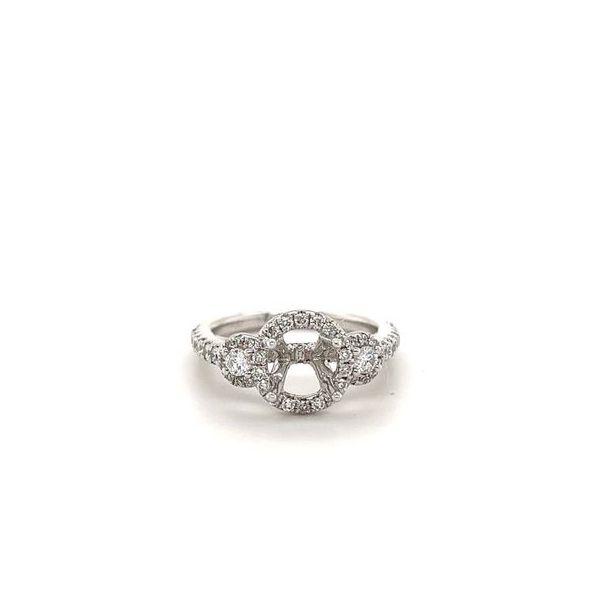 14KT WG SEMI MOUNT W/ ROUND DIAMOND HALO AND 2 ROUND DIAMONDS ON EACH SIDE WITH DIAMOND HALOS AND DIAMONDS IN BAND AS WELL AS PAVE SET DIAMONDS UNDER HALO .82CTTW Lennon's W.B. Wilcox Jewelers New Hartford, NY