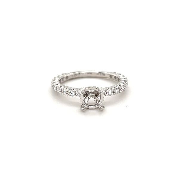 14KT WG SEMI MOUNT CONTAINING EOUND SHARED PRONG DIAMONDS IN SHANK W/ ROUND DIAMONDS IN HIDDEN HALO AND AT BASE OF PRONGS OF ROUND BUILT IN HEAD .78CTTW Lennon's W.B. Wilcox Jewelers New Hartford, NY