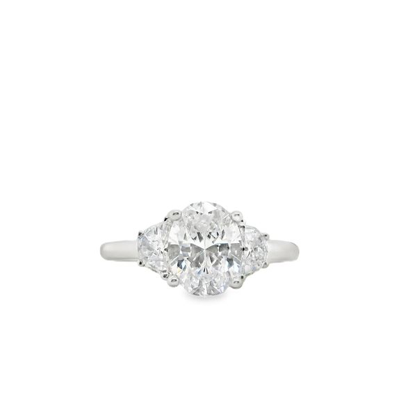 White 14 Karat Ring Size 6.5 With One 2.00Ct Oval Cubic Zirconium And 2 0.50Tw Heart Cubic Zirconiums Lennon's W.B. Wilcox Jewelers New Hartford, NY