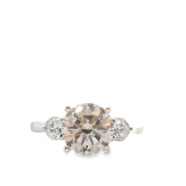 White 14 Karat Ring Size 6.5 With One 2.00Ct Round Cubic Zirconium And 2 0.40Tw Round Diamonds Lennon's W.B. Wilcox Jewelers New Hartford, NY