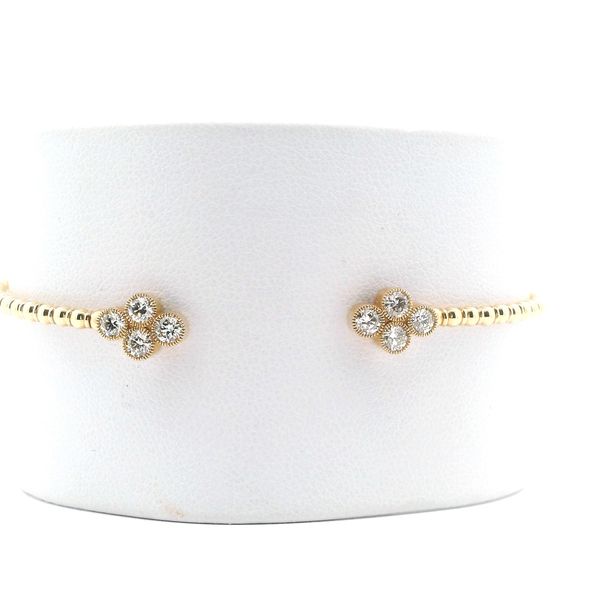 14KT Y/G DIAMOND OPEN CUFF BRACELET 4 DIAMONDS ON EACH END BEZEL SET = .64CTTW GH I1 Lennon's W.B. Wilcox Jewelers New Hartford, NY