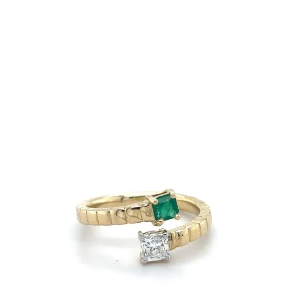 14Kt Yellow Gold Bypass Ring Containing One Cushion Diamond and One Cushion Emerald Lennon's W.B. Wilcox Jewelers New Hartford, NY