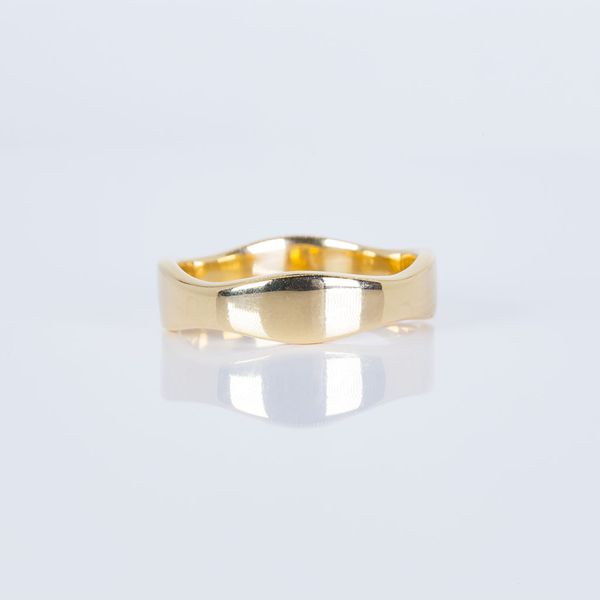 14K Yellow Gold "The Curve" Design Wedding Band Les Olson Jewelers Palm Harbor, FL