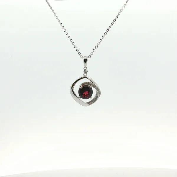 2.11CT GARNET AND 0.18CT TW WHITE TOPAZ PENDANT Lester Martin Dresher, PA