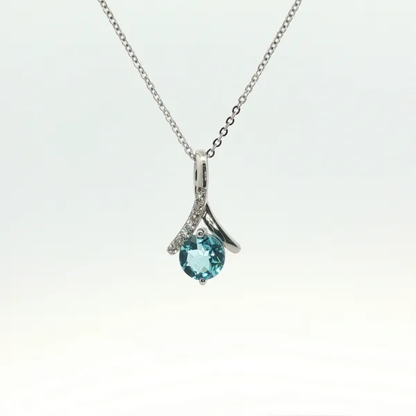 1.49CT ROUND BLUE TOPAZ PENDANT WITH 0.018CTW WHITE TOPAZ ACCENTS Lester Martin Dresher, PA