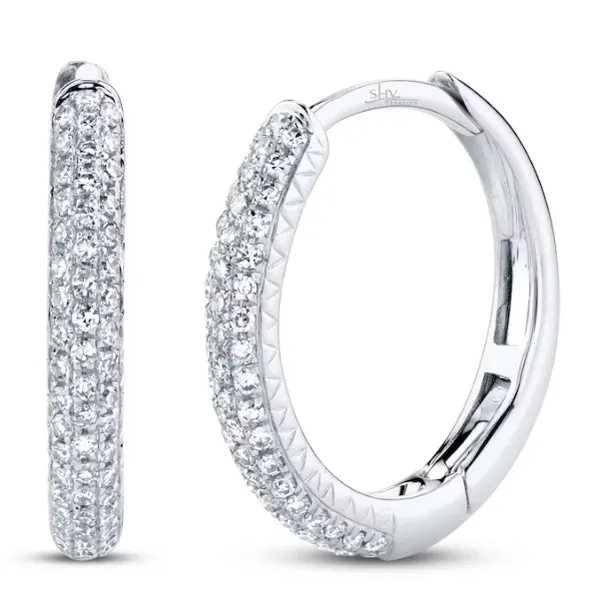 White 14 Karat Huggie Earrings with 0.21tw Round Diamonds Marc Robinson Jewelers Round Rock, TX