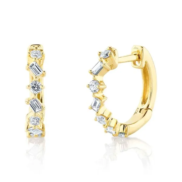 Yellow 14 Karat Huggie Earrings with 0.27tw Round & Baguette Diamonds Marc Robinson Jewelers Round Rock, TX