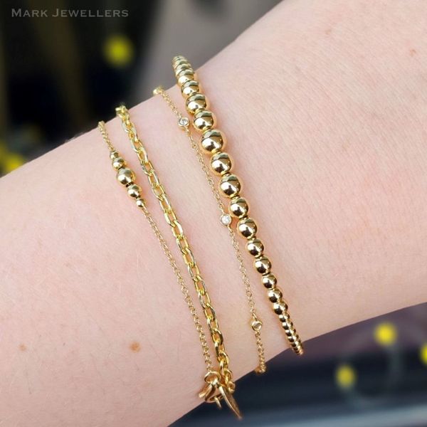 Yellow Gold Bangle Bracelet Image 3 Mark Jewellers La Crosse, WI