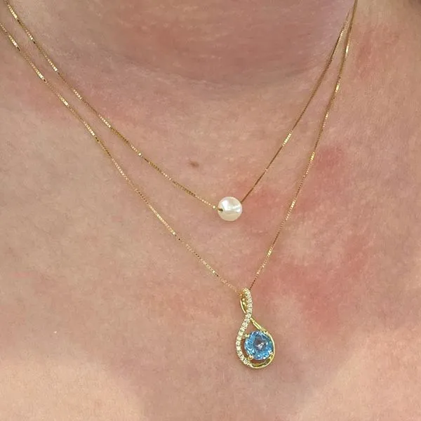 Yellow Gold Blue Topaz & Diamond Pendant Image 2 Mark Jewellers La Crosse, WI
