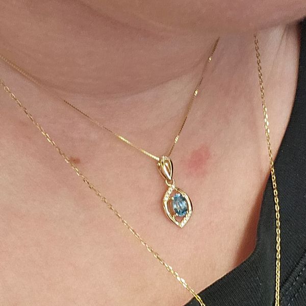Yellow Gold Blue Zircon & Diamond Pendant Image 3 Mark Jewellers La Crosse, WI
