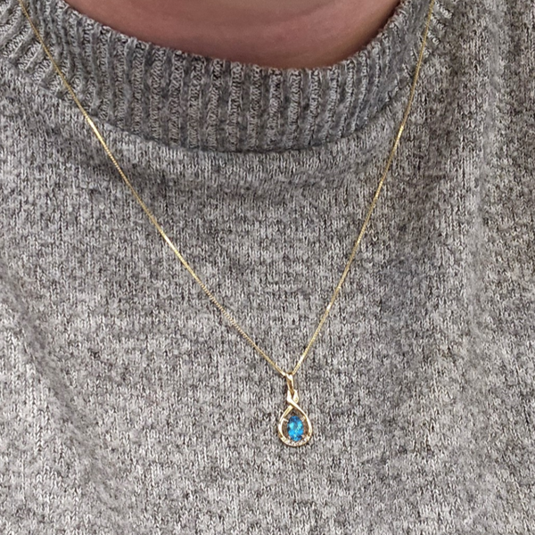Yellow Gold Blue Topaz & Diamond Pendant Image 3 Mark Jewellers La Crosse, WI