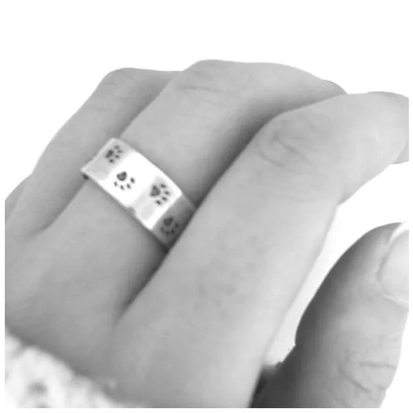 Sterling Oxidized Paw Print Band Image 2 Mark Jewellers La Crosse, WI