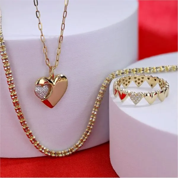 Spinning Double Heart Diamond Pendant Image 2 Miner's Den Jewelers Royal Oak, MI