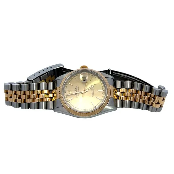 Two Tone Rolex Datejust With Champagne Roman Dial Fluted Bezel Stainless Steel And 18K Yellow Automatic Watch Image 3 Miner's Den Jewelers Royal Oak, MI