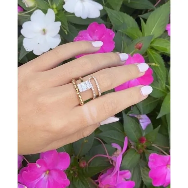 Contemporary Spiral 14Kt Yellow Gold Diamond Ring – 0.87 Ct Baguette Cente Image 3 Mollys Jewelers Brooklyn, NY