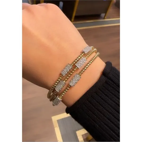 FlexBrick Diamond Accented Yellow Gold Coil Bangle Image 2 Mollys Jewelers Brooklyn, NY