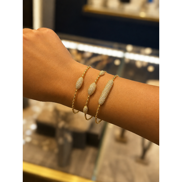 14K Yellow Gold Diamond Pavé Oval Station Bangle – 0.48 CTW Image 2 Mollys Jewelers Brooklyn, NY