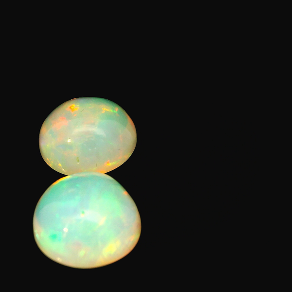 Pair of Round Shape Natural Opals, 7.29 carat total weight 291-00053 Image 2 Monarch Jewelry Winter Park, FL