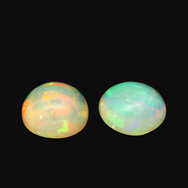 Pair of Round Shape Natural Opals, 7.29 carat total weight 291-00053 Monarch Jewelry Winter Park, FL