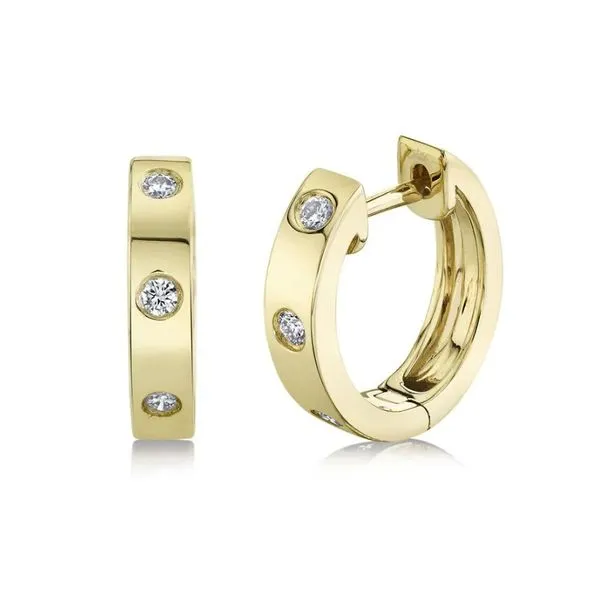 Lady's Yellow 14K Diamond Huggie Earrings Moore Jewelers Laredo, TX