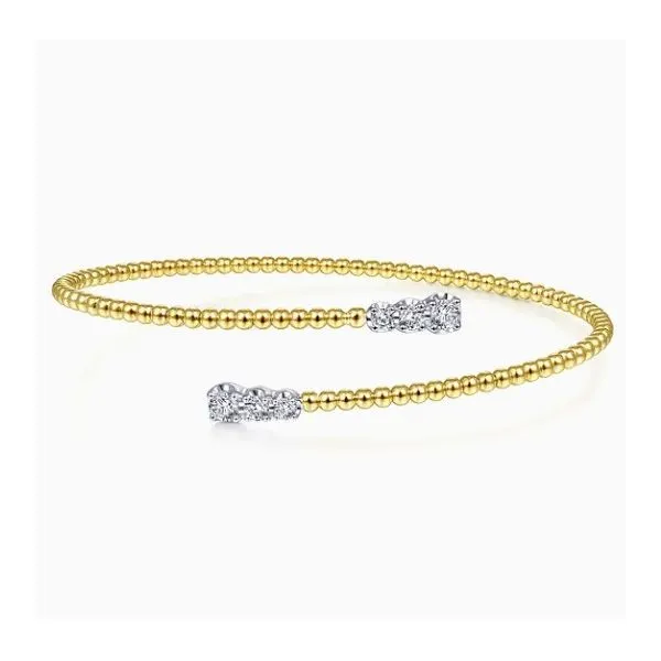 Two Tone 14K Yellow & White Gold Bypass Diamond Bracelet Moore Jewelers Laredo, TX