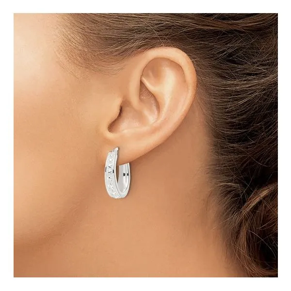 Lady's White Sterling Silver Small Hoop Earrings Polished Star Oval Hoops Image 3 Morin Jewelers Southbridge, MA