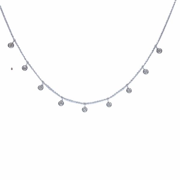 Diamond station necklace with diamond dangles 