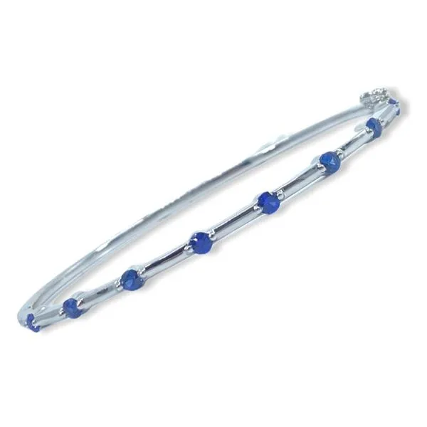 Jye international blue sapphire bangle in 18 K white gold 