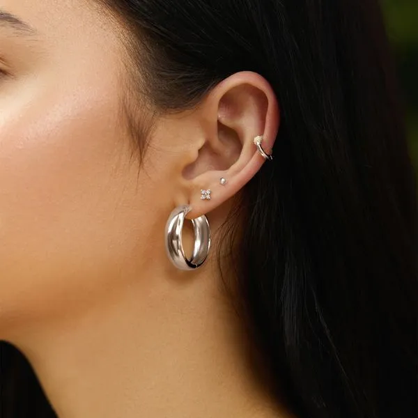 Sterling Silver Four-Petal Stud Earrings Image 2 Orin Jewelers Northville, MI