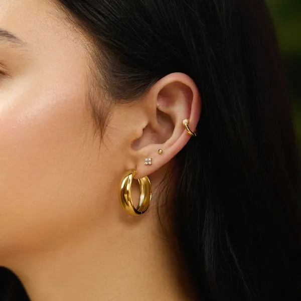 Sterling Silver Gold Plated Four-Petal Stud Earrings Image 2 Orin Jewelers Northville, MI