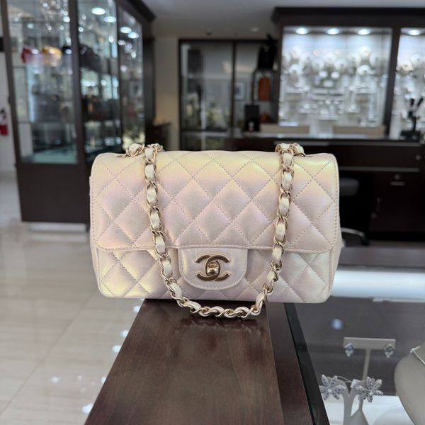 Pre-Owned Chanel Mini Rectangular Flap Bag in Shimmering Iridescent White with Gold-Tone Hardware Perry's Diamonds & Estate Jewelry Charlotte, NC