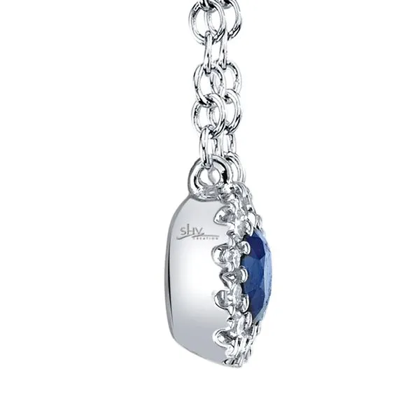 Shy Creation Blue Sapphire Diamond Halo Necklace Image 3 Peter & Co. Jewelers Avon Lake, OH