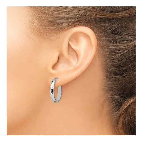 Polished Twisted Oval Hoop Earrings Image 3 Peter & Co. Jewelers Avon Lake, OH