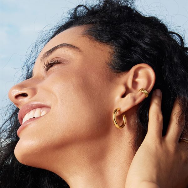 Ania Haie Gold Classic Tube Hoop Earrings Image 2 Peter & Co. Jewelers Avon Lake, OH