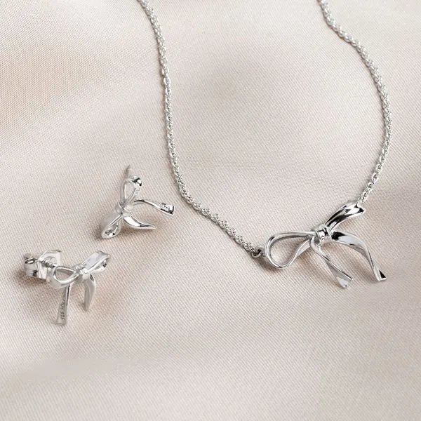 Sterling Silver Rhodium Plated Serenity Ribbon Bow Dainty Stud Earrings Image 3 Quality Gem LLC Bethel, CT