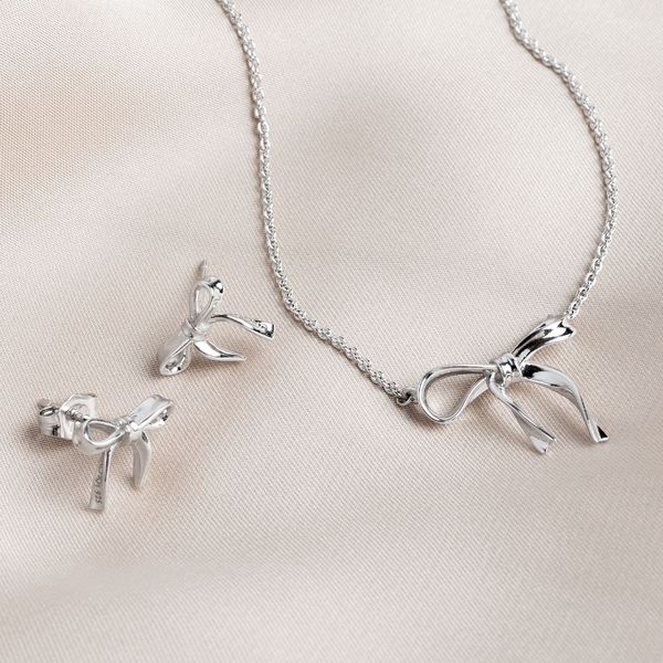 Sterling Silver Rhodium Plated Serenity Ribbon Bow Dainty Stud Earrings Image 3 Quality Gem LLC Bethel, CT