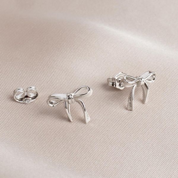 Sterling Silver Rhodium Plated Serenity Ribbon Bow Dainty Stud Earrings Image 5 Quality Gem LLC Bethel, CT