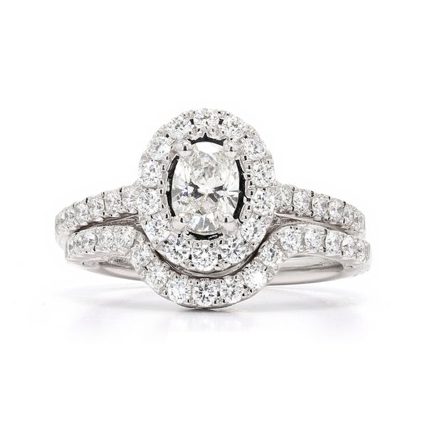14K White Gold 1.33ctw G-H/SI1-2 Oval Halo Diamond + Band Signature Wedding Set Raleigh Diamond Fine Jewelry Raleigh, NC