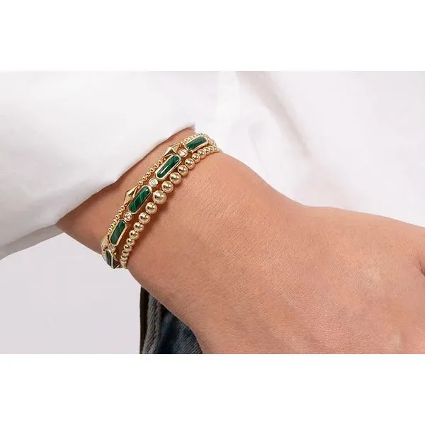 14K Yellow Gold Bujukan Open Flexible Bangle Bracelet Image 4 Raleigh Diamond Fine Jewelry Raleigh, NC
