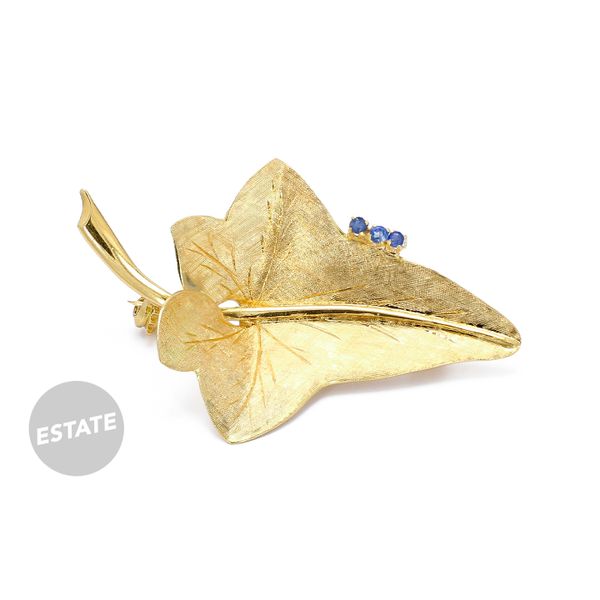 Estate 18K Yellow Gold Leaf Brooch with Blue Sapphires Raleigh Diamond Fine Jewelry Raleigh, NC