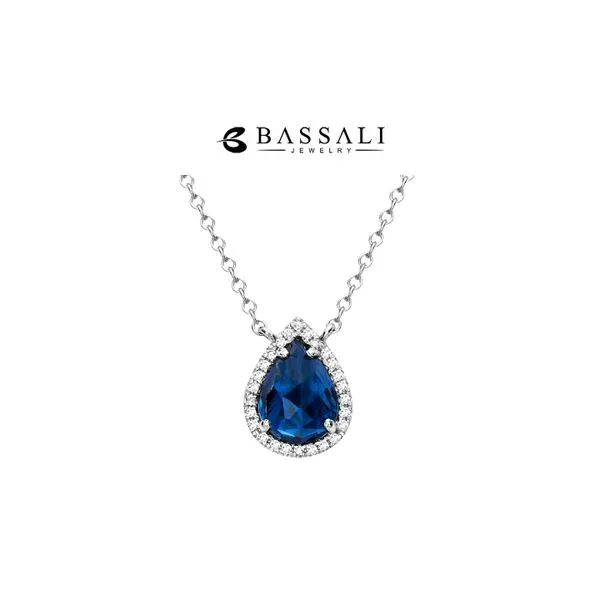 Bassali 14K White Gold 1.43ctw London Blue Topaz Pear + Halo Diamonds 0.06ctw Raleigh Diamond Fine Jewelry Raleigh, NC