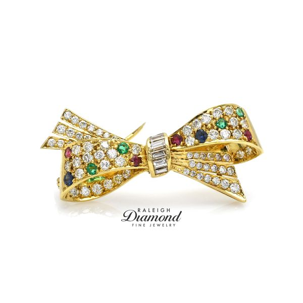 18K Yellow Gold Bow Brooch with Diamond, Ruby, Emerald & Sapphire Raleigh Diamond Fine Jewelry Raleigh, NC