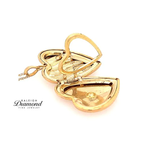 10K Yellow Gold Heart Locket with Diamond Image 4 Raleigh Diamond Fine Jewelry Raleigh, NC
